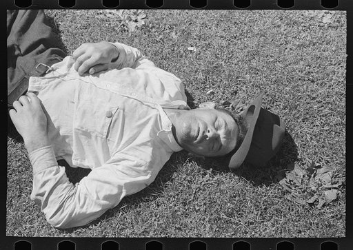 Transient laborer asleep in gateway district, Minneapolis, Minnesota