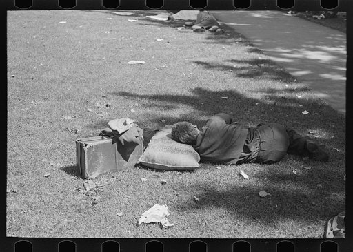 Man asleep in park, Gateway District, Minneapolis, Minnesota