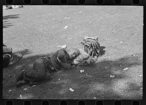 Transient laborer resting, Gateway District, Minneapolis, Minnesota