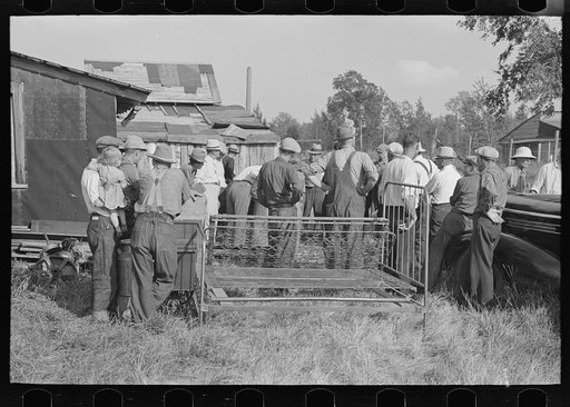 Group of people at the S.W. Sparlin auction sale, Orth, Minnesota