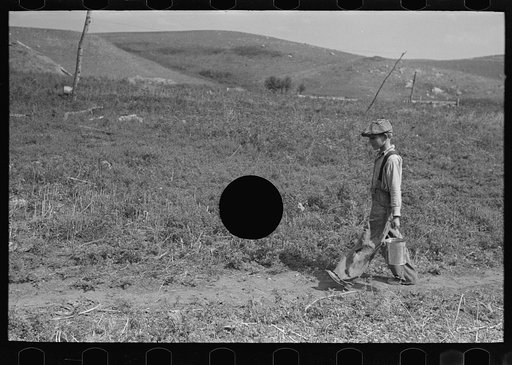 Untitled photo, possibly related to: William Huravitch and son, carrying water to their home; the source is about a half mile away. Williams County, North Dakota