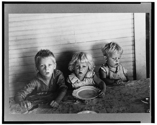 Children of Olaf Fugelberg waiting for dinner. Williams County, North Dakota