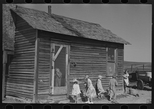 Children in front of Olaf Fugelberg's farmhouse. Williams County, North Dakota