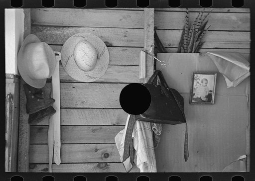 Untitled photo, possibly related to: Part of room in cut-over farmhouse, near Northome, Minnesota