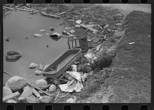 Untitled photo, possibly related to: Doll buggy on farm near Northome, Minnesota