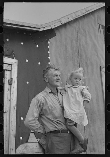 Untitled photo, possibly related to: Cut-over farmer and daughter, near Northome, Minnesota