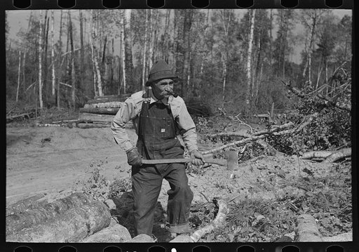 Old lumberjack, over seventy and still working at camp near Effie, Minnesota