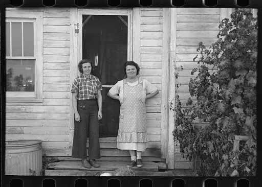 Wife and daughter of cut-over pioneer farmer near Little Fork, Minnesota