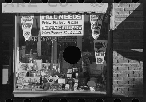 Untitled photo, possibly related to: Hardware store window, Crosby, North Dakota