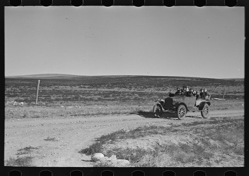 Untitled photo, possibly related to: The Harshenberger [i.e. Harshbarger] family going to town in their car near Antelope, Montana