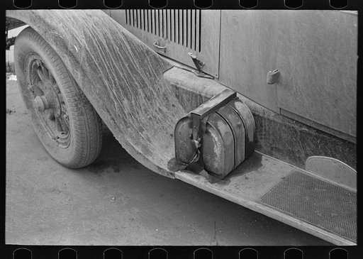 Water, oil and gas on farmer's car. Williston, North Dakota