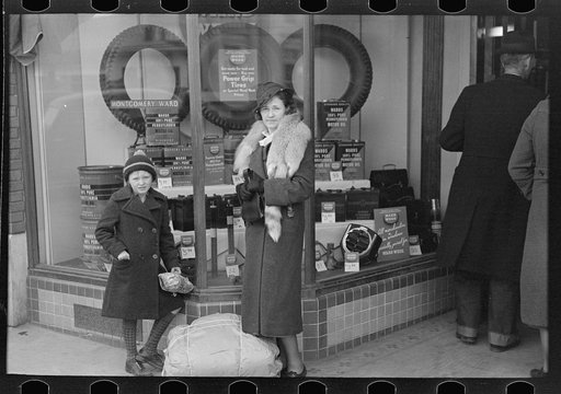 Untitled photo, possibly related to: Farm family window shopping, Williston, North Dakota