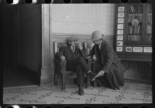 Men talking in the Great Northern Hotel, Williston, North Dakota