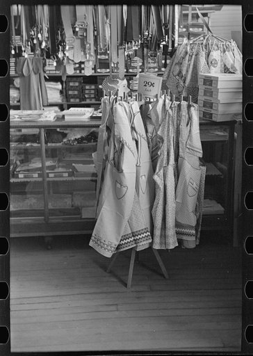Aprons on display in general store, Ray, North Dakota