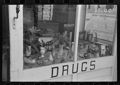 Drugstore window, Ray, North Dakota