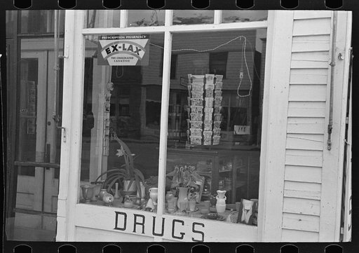 Drugstore window, Ray, North Dakota