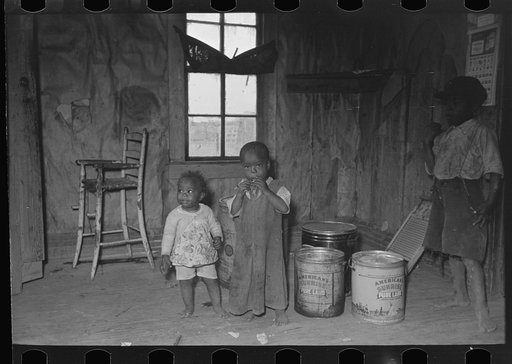 Southeast Missouri Farms. Family of sharecropper in kitchen of shack