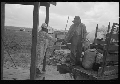 Untitled photo, possibly related to: Southeast Missouri Farms. Loading truck in process of moving FSA (Farm Security Administration) client to new farm unit