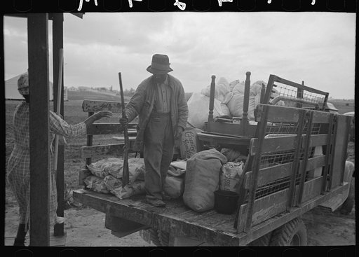 Untitled photo, possibly related to: Southeast Missouri Farms. Loading truck in process of moving FSA (Farm Security Administration) client to new farm unit