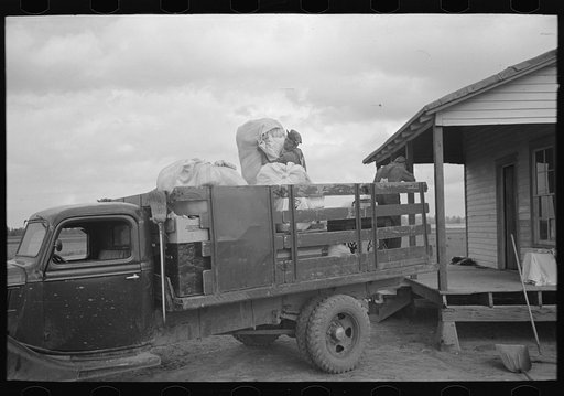 Untitled photo, possibly related to: Southeast Missouri Farms. Moving from old home to new