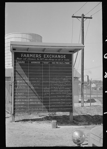 Untitled photo, possibly related to: Bulletin board of farmer's exchange at liquid feeding station, Owensboro, Kentucky