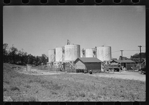 Untitled photo, possibly related to: Farmers leaving liquid feed loading station, Owensboro, Kentucky