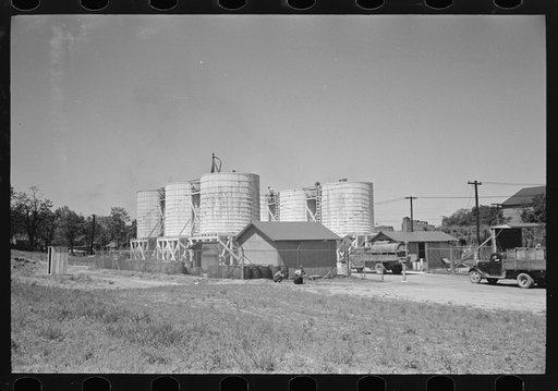 Untitled photo, possibly related to: Farmers leaving liquid feed loading station, Owensboro, Kentucky