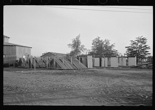 House plant; general view of completed trusses and panels stacked for delivery, Southeast Missouri Farms
