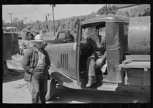 Untitled photo, possibly related to: Farmers leaving liquid feed loading station, Owensboro, Kentucky