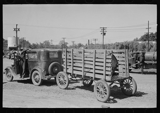 Untitled photo, possibly related to: Farmers leaving liquid feed loading station, Owensboro, Kentucky