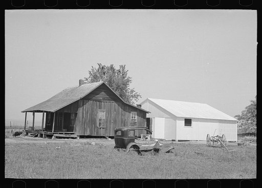 Untitled photo, possibly related to: Front porch of sharecropper cabin, Southeast Missouri Farms