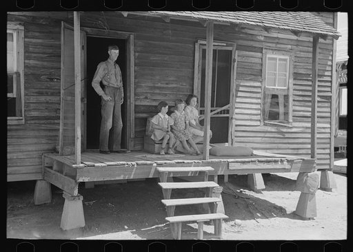 Untitled photo, possibly related to: Front porch of sharecropper cabin, Southeast Missouri Farms