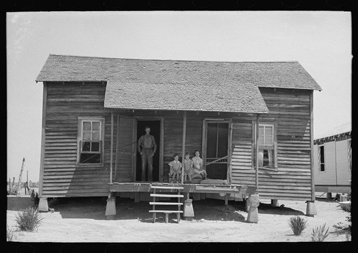 Untitled photo, possibly related to: Front porch of sharecropper cabin, Southeast Missouri Farms