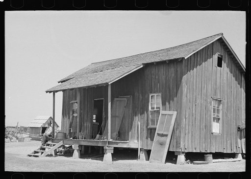 Untitled photo, possibly related to: Front porch of sharecropper cabin, Southeast Missouri Farms