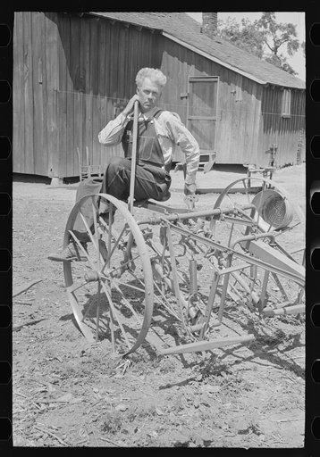 FSA (Farm Security Administration) client, former sharecropper, with cultivator, Southeast Missouri Farms