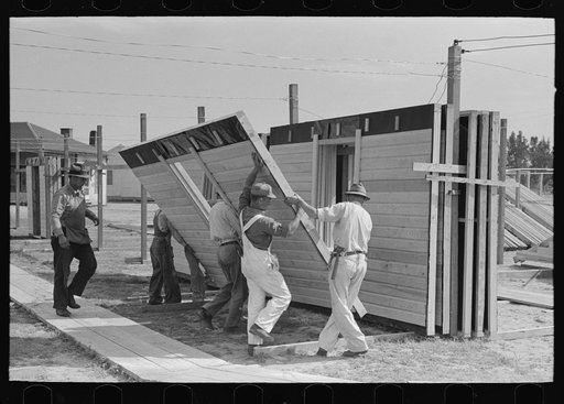House plant. Finished panel being placed in the stack for priming. Southeast Missouri Farms Project