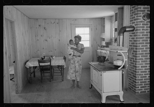 Untitled photo, possibly related to: Southeast Missouri Farms. FSA (Farm Security Administration) clients preparing greens for canning