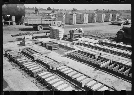Precast concrete plant. Precasting reinforced concrete house and barn piers. Southeast Missouri Farms Project