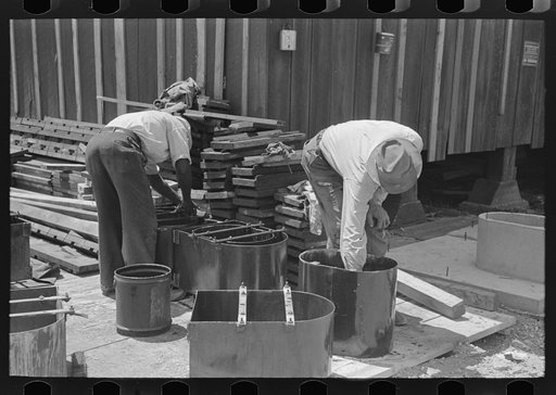 Privy plant. Cleaning metal forms for sanitary privy base. Southeast Missouri Farms Project