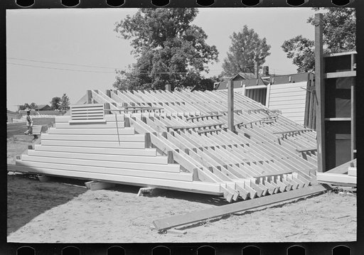 House plant. View of completed gable end panels in stacks for delivery to the job. Southeast Missouri Farms Project