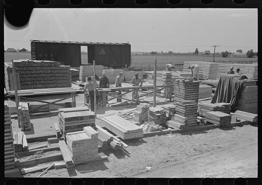 House plant. General view of precutting operation showing the precut material stacked and marked