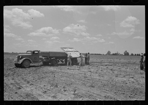 Barn erection. Unloading panels at the site. Southeast Missouri Farms Project