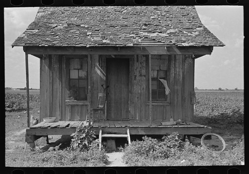 Front porch of sharecropper cabin, New Madrid County, Missouri