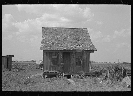 Untitled photo, possibly related to: Front porch of sharecropper cabin, New Madrid County, Missouri