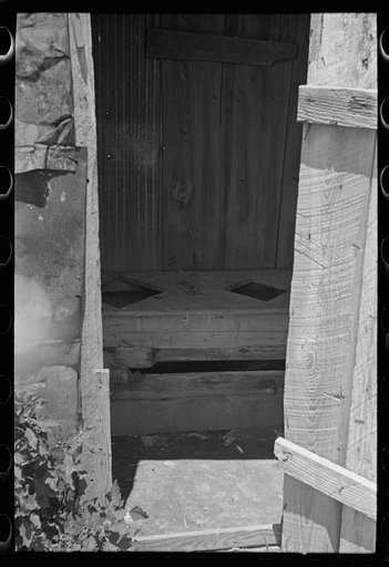 Interior of sharecropper privy, New Madrid County, Missouri