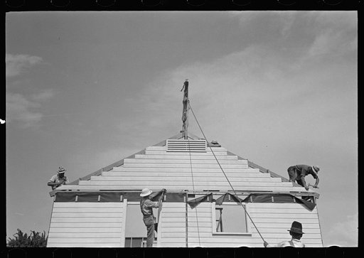 Southeast Missouri Farms. Erecting gable end on house