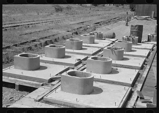 Privy plant. Sanitary pre-cast concrete privy bases after stripping of forms. Southeast Missouri Farms Project