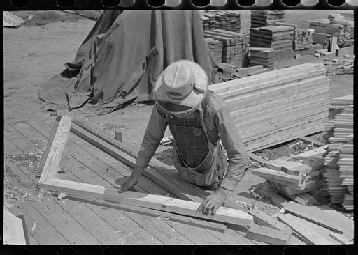 Untitled photo, possibly related to: Food storage plant. Placing precut rafters in jig for making trusses. Southeast Missouri Farms Project