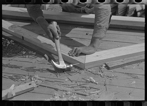 Food storage plant. Closeup of shop assembly of trusses. Southeast Missouri Farms Project