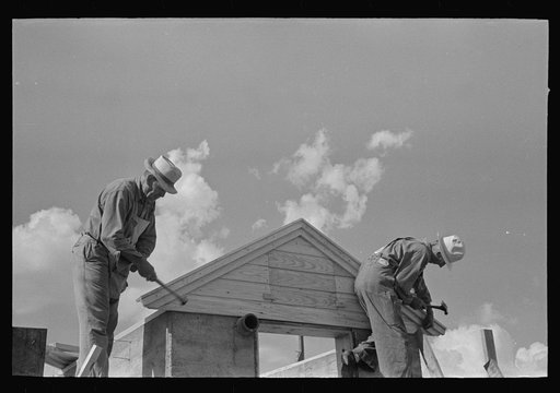 Untitled photo, possibly related to: Food storage. Forms stripped from walls. Bolting on plates for roof construction. Southeast Missouri Farms Project